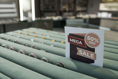 Sale announcement of fifty percent discount in contemporary jewelry boutique on black fridayの写真素材