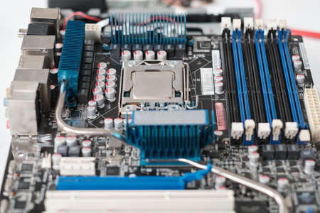 Part of large processor or motherboard needing repairment with many small details and microchip