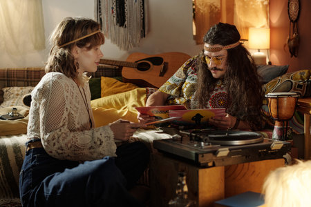 Sharing a Moment While Listening to Vinyl Recordsの写真素材