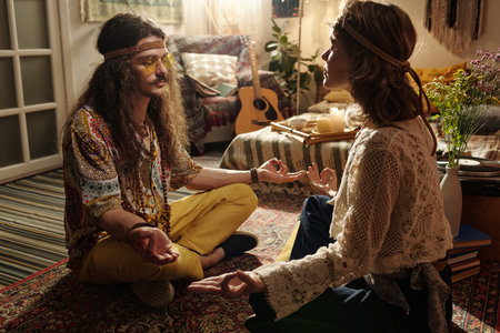 Practicing Meditation in a Cozy Bohemian-Inspired Roomの写真素材