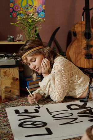 Creating Inspirational Artwork in Cozy Studioの写真素材