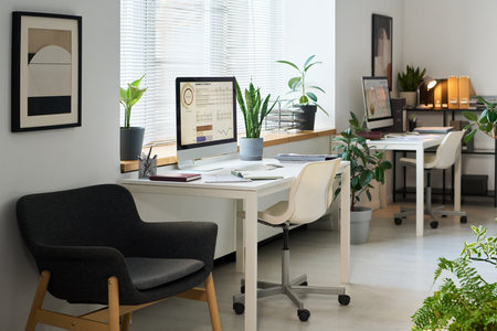 Workplaces With Computers In Modern Office