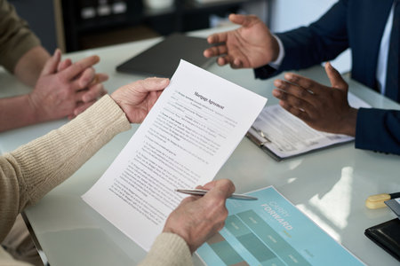 Senior Couple Concluding Mortgage Agreementの写真素材