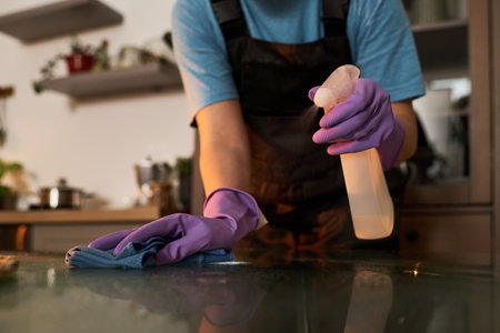 Cleaner Wiping Dust From Furnitureの写真素材