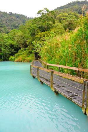 Bridge over famous blue colored Sun Moon lake in Taiwanの写真素材