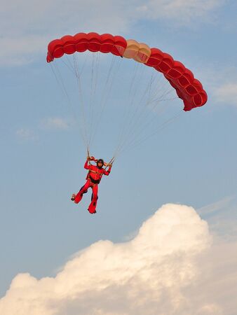 Red Lions parachutist landing at Marina Bay Floating Platform during National Day Parade Singapore 2011 Combined Rehearsal on July 02, 2011 in Singaporeのeditorial素材