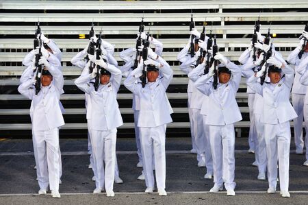 Guard-of-Honor contingent firing Feu de joie (rifle salute) during National Day Parade Singapore 2011 Combined Rehearsal on June 25, 2011 in Singaporeのeditorial素材