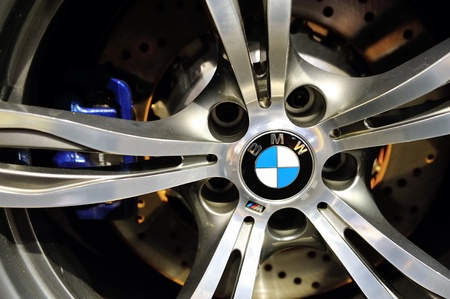 Large wheel alloy and carbon ceramic brake of BMW M6 Convertible at its Preview at Singapore Yacht...