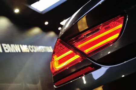Rear LED lights of a BMW M6 Convertible at its Preview at Singapore Yacht Show April 28, 2012 in Singaporeのeditorial素材
