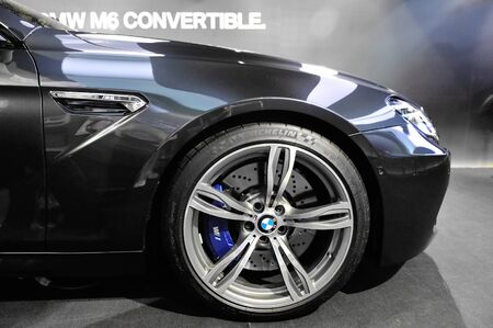 Bonnet and large alloy wheel of BMW M6 Convertible at its Preview at Singapore Yacht Show April 28,...