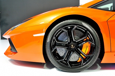Bonnet and wheel with carbon ceramic brake of Lamborghini Aventador LP 700-4 at Singapore Yacht Show April 28, 2012 in Singaporeのeditorial素材
