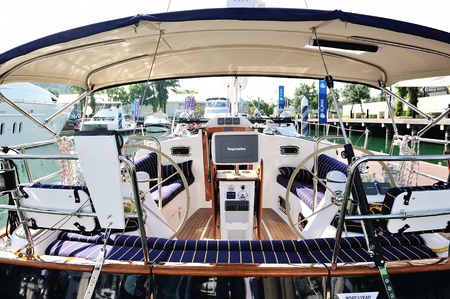 Interior of a luxury yacht with its steering and navigation system at Singapore Yacht Show April 28,...