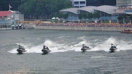 Republic of Singapore Navy assault boats giving chase during National Day Parade 2012 on August 09, 2012 in Singaporeのeditorial素材