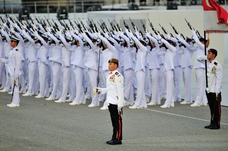 Parade Commander LTC Clarence Tan commanding feu de joie during National Day Parade 2012 on August...