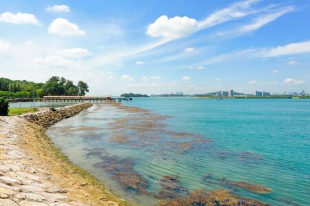 Clear blue sea surrounding scenic St John Island, Singaporeの写真素材