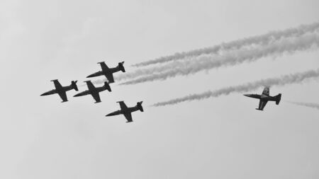 Apache roll aerobatics maneuvers by Breitling Jet Team at Sentosa Siloso Beach March 9, 2013 in Singaporeのeditorial素材