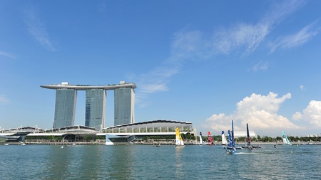 Sailing teams racing at the Extreme Sailing Series race at Marina Bay Reservoir April 13, 2013 in Singaporeのeditorial素材