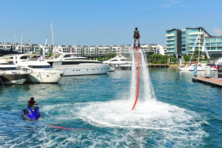 Demonstration of Zapata Racing water propelled flyboard at the Singapore Yacht Show 2013 at One Degree 15 Marina Club, Sentosa Cove April 20, 2013 in Singaporeのeditorial素材
