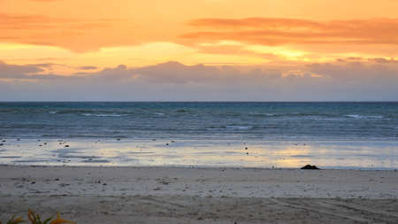 Sun rising in the horizonの写真素材