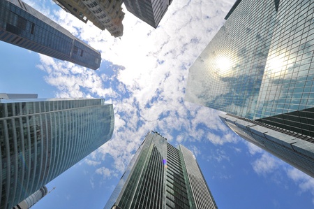 Skyscrappers against the sky in Singpaore business districtの写真素材