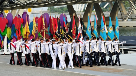 SINGAPORE - JULY 20: Colors party marching past during National Day Parade (NDP) Rehearsal 2013 on July 20, 2013 in Singaporeのeditorial素材