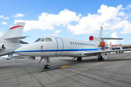 SINGAPORE - FEBRUARY 12  Falcon 7X business jet on display at Singapore Airshow February 12, 2012 in Singaporeのeditorial素材