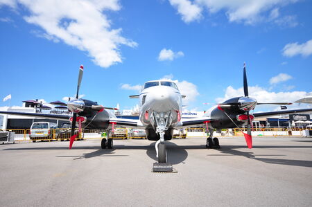 SINGAPORE - FEBRUARY 12  King Air 350ER turboprop aircraft on display at Singapore Airshow February 12, 2012 in Singaporeのeditorial素材