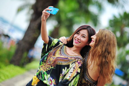 SINGAPORE - APRIL 12: Model showcasing vibrant and luxurious designs by Camilla (with Wattletree) during Singapore Yacht Show fashion event at One Degree 15 Marina Club Sentosa Cove April 12, 2014 in Singaporeのeditorial素材