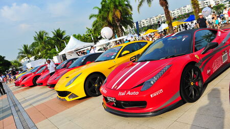 SINGAPORE - APRIL 12: Singapore Ferrari Club Owners showcasing their Ferrari cars during Singapore Yacht Show at One Degree 15 Marina Club Sentosa Cove April 12, 2014 in Singaporeのeditorial素材