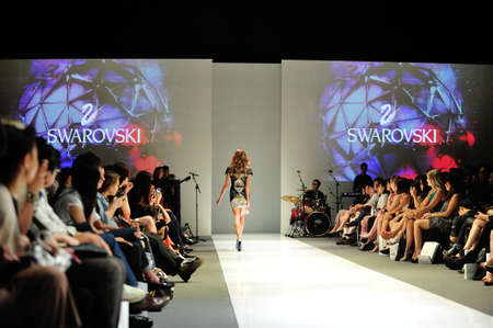 SINGAPORE - MAY 18: Model showcasing designs from Swarovski with the theme Kingdom of Jewels at Audi Fashion Festival 2012 on May 18, 2012 in Singaporeのeditorial素材