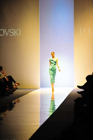 SINGAPORE - MAY 14: Model showcasing designs from Swarovski at Audi Fashion Festival 2011 on May 14, 2011 in Singaporeのeditorial素材