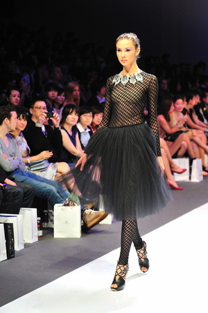 SINGAPORE - MAY 14: Model showcasing designs from Swarovski at Audi Fashion Festival 2011 on May 14, 2011 in Singaporeのeditorial素材