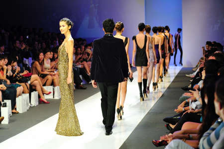 SINGAPORE - MAY 14: Model showcasing designs from Swarovski at Audi Fashion Festival 2011 on May 14,...