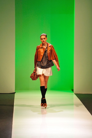 SINGAPORE - MAY 17: Model showcasing designs from Alldressedup at Audi Fashion Festival 2011 on May 17, 2011 in Singaporeのeditorial素材