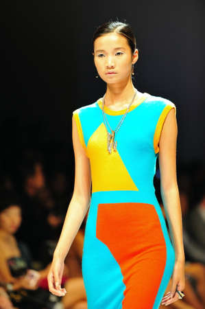 SINGAPORE - MAY 14: Model showcasing designs from Swarovski at Audi Fashion Festival 2011 on May 14, 2011 in Singaporeのeditorial素材