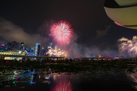 SINGAPORE - AUGUST 02: Fireworks display during National Day Parade (NDP) Preview 2014 on August 02, 2014 in Singaporeのeditorial素材