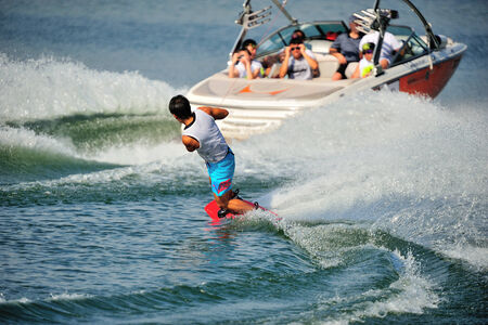 SINGAPORE - JULY 20: Athlete performing stunt during Rip Curl Singapore National Inter Varsity & Polytechnic Wakeboard Championship 2014 on July 20, 2014 in Singaporeのeditorial素材