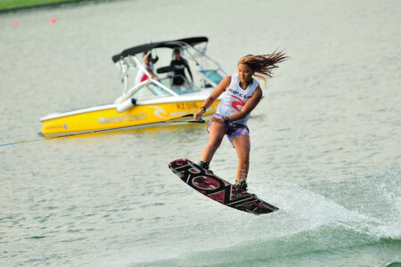 SINGAPORE - JULY 20: Athlete performing stunt during Rip Curl Singapore National Inter Varsity & Polytechnic Wakeboard Championship 2014 on July 20, 2014 in Singaporeのeditorial素材