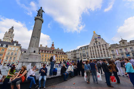 LILLE - SEPTEMBER 13: The Grand Place, a highlight of Lille and its Goddess, a symbol of the resistance against the Austrians on September 13, 2014 in Lille, Franceのeditorial素材