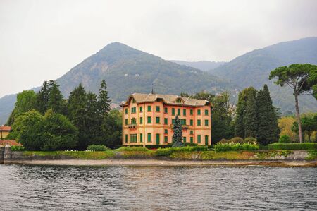 COMO - OCTBER 2: Luxury villas along the bank of Lake Como on October 2, 2013 in Como, Italyのeditorial素材