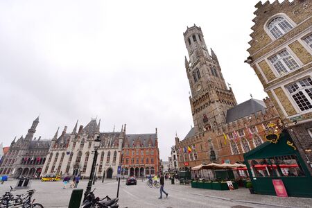 BRUGES - SEPTEMBER 14: Grote Markt (Market Square) and famous Belfry of Bruges on September 14, 2014 in Bruges, Belgiumのeditorial素材