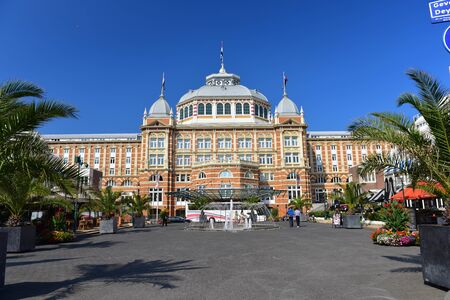 SCHEVENINGEN - SEPTEMBER 18: The famous Grand Hotel Amrath Kurhaus hotel located next to Scheveningen beach, taken on September 18, 2014 in Scheveningen, Netherlandsのeditorial素材
