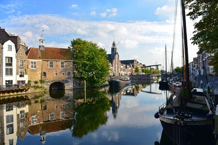 ROTTERDAM - SEPTEMBER 18: Pilgrim Fathers Church and historic houses along River Nieuwe Maas at Delfshaven, taken on September 18, 2014 in Rotterdam, Netherlandsのeditorial素材