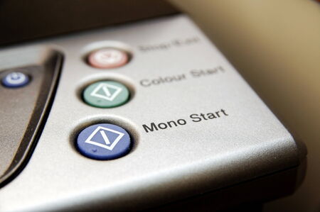 Buttons on a color photocopier machineの写真素材