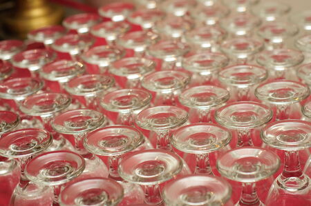 Rows of inverted glassesの写真素材