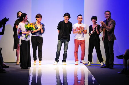 SINGAPORE - MAY 17: Designers thanking guests after the show at Audi Fashion Festival 2011 alldressedup Show on May 17, 2011 in Singapore.のeditorial素材