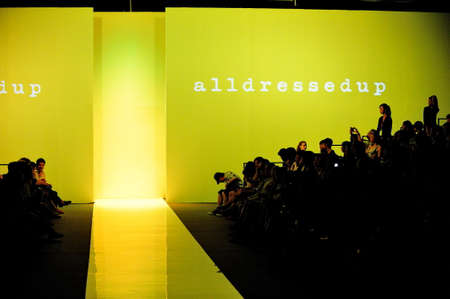 SINGAPORE - MAY 17: alldressedup backdrop and spectator gallery at Audi Fashion Festival 2011 alldressedup Show on May 17, 2011 in Singapore.のeditorial素材