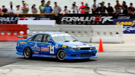 SINGAPORE - JULY 05: Malaysian driver Fairuz drifting during Formula Drift Singapore 2009 Pro-am...