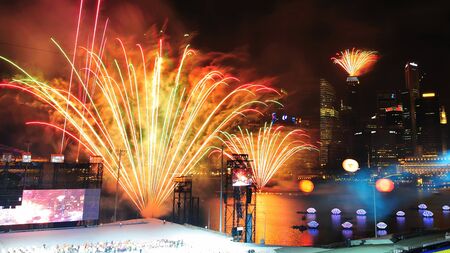 SINGAPORE - JUNE 18: Fireworks display during National Day Parade Singapore 2011 Combined Rehearsal on June 18, 2011 in Singapore.のeditorial素材