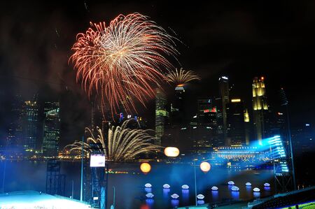 SINGAPORE - JUNE 18: Fireworks display during National Day Parade Singapore 2011 Combined Rehearsal on June 18, 2011 in Singapore.のeditorial素材